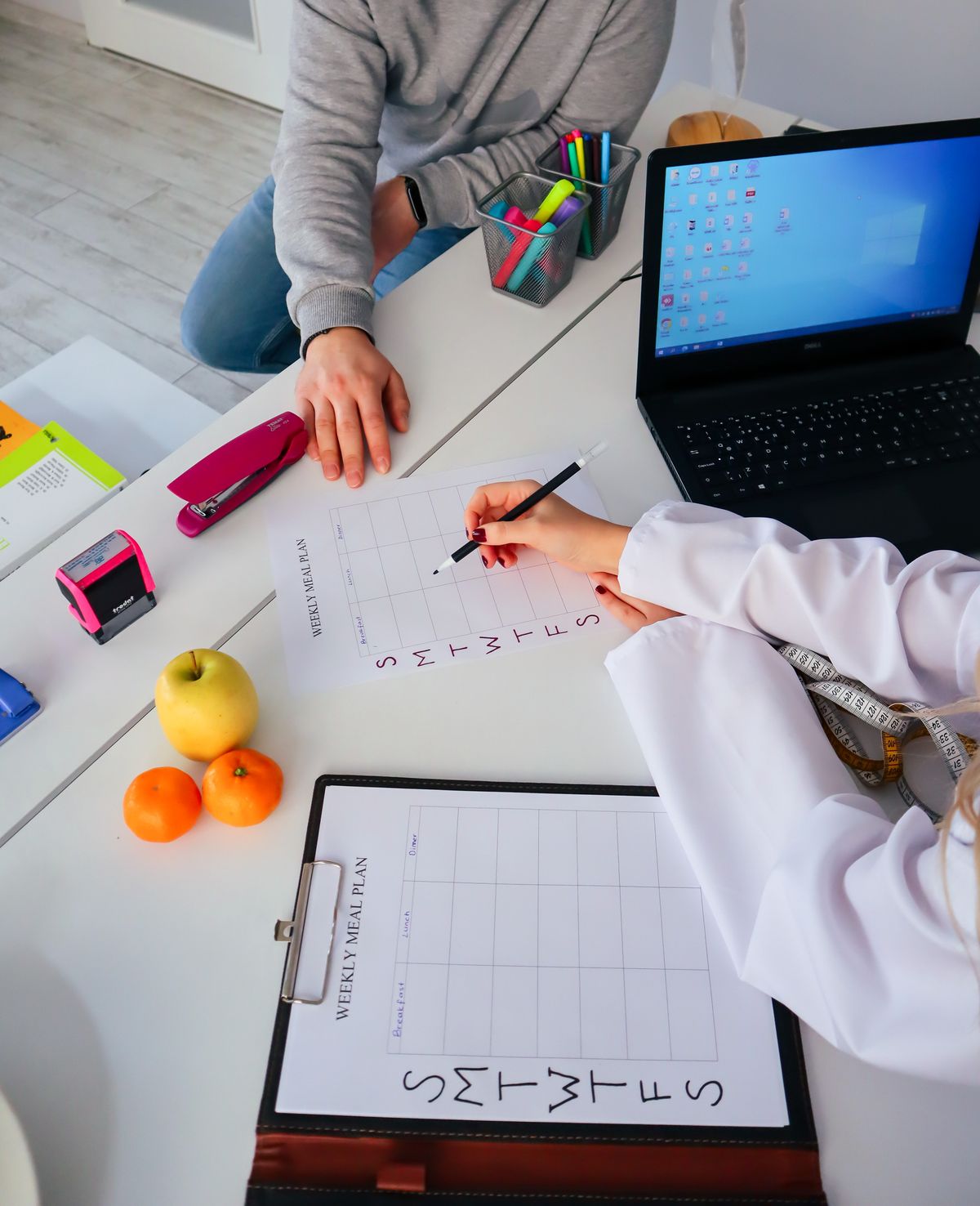 Nutritionist preparing a personalized meal plan